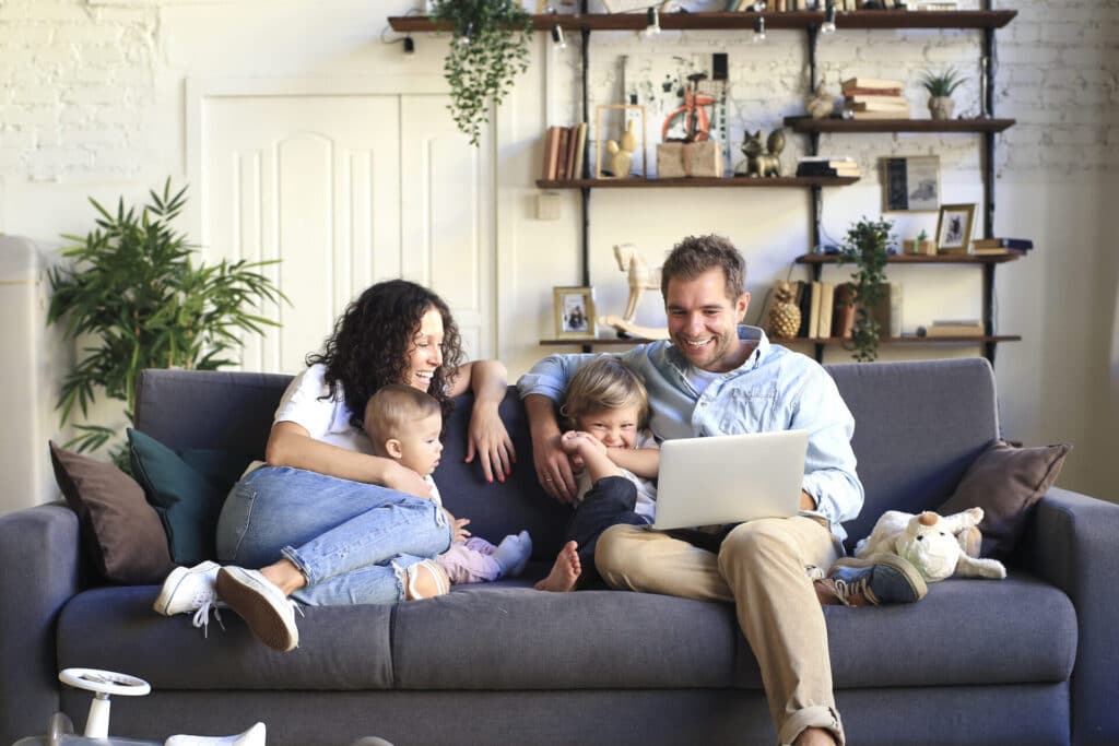 Family together on couch - home insurance